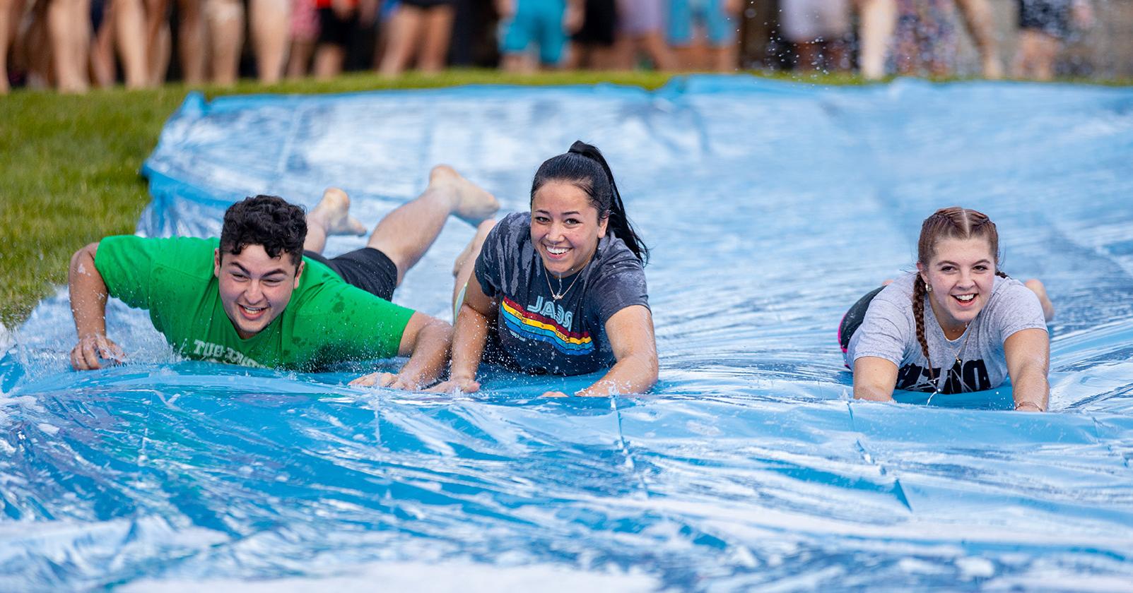 Students enjoy welcome weekend slip-and-slide